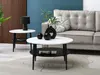 A living room scene with a couch, coffee tables, and a side table. Náhľad obrázku produktu