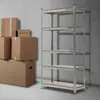 A metal shelving unit next to a stack of cardboard boxes against a concrete wall. Náhľad obrázku produktu