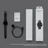 A flat lay of a Samsung Galaxy Watch6 Classic and its accessories, including the watch, charging cable, and packaging. Náhľad obrázku produktu