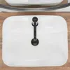 A white rectangular sink with a black faucet, placed on a wooden surface. Náhľad obrázku produktu