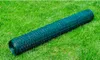 A roll of green wire fencing lies on a green lawn. Náhled obrázku produktu