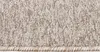 A close-up view of a carpet with a textured pattern and a finished edge. Anteprima dell’immagine prodotto