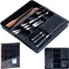 A black cutlery organizer with cutlery and a wooden spoon inside, along with a packaged organizer and a close-up of the organizer. Náhled obrázku produktu