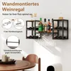 A wall-mounted wine rack with bottles and glasses, shown in a room setting with a table and chairs. Podgląd zdjęcia produktu