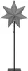 A gray star-shaped lamp on a black stand against a white background. Podgląd zdjęcia produktu