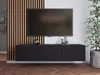 A modern living room setup with a wall-mounted TV and media console. Produktbild-Vorschau
