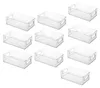 A collection of clear plastic storage bins arranged in a grid. Produktbild-Vorschau
