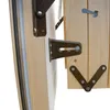 Close-up view of the metal hinges and wooden components of a folding attic ladder. Produktbild-Vorschau
