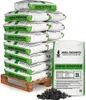 A stack of bags of coal on a pallet, with a single bag and some loose coal in the foreground. Produktbild-Vorschau