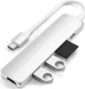 A silver USB-C hub with multiple ports, including HDMI, USB-A, and SD card slots, is shown against a white background. Voir les images du produit