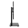 Side view of a black TV stand with a flat base and a vertical pole supporting a TV mount. Produktbild-Vorschau