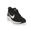 A black Nike Star Runner 4 sneaker with a white swoosh logo and white sole, shown on a white background. Voir les images du produit