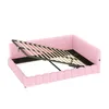A pink upholstered bed frame with the mattress support mechanism lifted. Náhled obrázku produktu