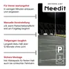 A dark parking lot at night with a street light and a sign indicating parking. Náhľad obrázku produktu