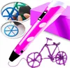 A pink 3D printing pen is shown with inset images demonstrating its use and a finished purple bicycle model. Náhľad obrázku produktu