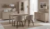 A dining room set with a table, chairs, and cabinets. Produktbild-Vorschau