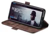 A smartphone in a brown leather flip case is displayed at an angle, showing a movie streaming interface on its screen. Produktbild-Vorschau