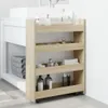 A narrow storage cart with four shelves is placed next to a bathroom vanity. The cart is filled with various bathroom items. Podgląd zdjęcia produktu