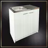 A white kitchen cabinet with a stainless steel sink and drainer, set against a black background with a decorative gold border. Produktbild-Vorschau