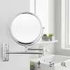 A wall-mounted makeup mirror in a bathroom setting. Produktbild-Vorschau