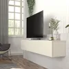 A modern living room with a wall-mounted TV stand and television. Produktbild-Vorschau