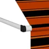 A close-up view of a retractable awning with orange and black stripes. Produktbild-Vorschau
