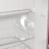 Close-up view inside a refrigerator, showing the interior light and temperature control dial. Produktbild-Vorschau