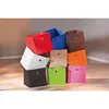 A stack of colorful storage boxes. Produktbild-Vorschau