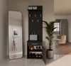 A modern entryway with a black hall tree and shoe cabinet, a tall mirror, and a potted plant. Produktbild-Vorschau