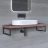 A bathroom vanity with a sink and faucet. Produktbild-Vorschau