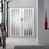 A folding door with glass panels in a modern interior setting. Produktbild-Vorschau