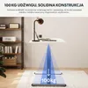 A white standing desk with a laptop, lamp, and cup is shown, with a diagram illustrating its weight capacity and stability features. Podgląd zdjęcia produktu