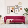 A living room scene with a magenta sofa, artwork on the wall, and a plant. Produktbild-Vorschau