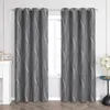 A pair of dark gray curtains with a white wavy pattern hanging in front of a window. Produktbild-Vorschau