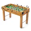 A foosball table is shown from a slightly elevated angle against a white background. Podgląd zdjęcia produktu