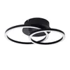 A black LED ceiling light with two intertwined rings, presented against a white background. Anteprima dell’immagine prodotto