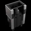 A 3D rendering of a fireplace insert with a black interior and gray exterior panels, set against a black background. Produktbild-Vorschau