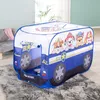 A Paw Patrol themed pop-up play tent shaped like a vehicle, set up on a rug in a room. Náhled obrázku produktu