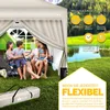 A family is enjoying themselves under a beige pop-up pavilion in a grassy outdoor setting with a lake in the background. Voir les images du produit