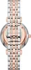 A close-up view of a watch band and the back of a watch case. Voir les images du produit