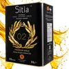 A large metal tin of olive oil with gold olive branches and text on a white and yellow background with splashes of oil. Produktbild-Vorschau