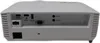 The back panel of a white projector, showing various input and output ports. Produktbild-Vorschau