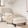 A bedroom scene with a single bed and bedding. Podgląd zdjęcia produktu