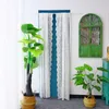 A room interior with curtains, plants, and a decorative window. Náhľad obrázku produktu