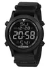 A black digital watch with a nylon strap is shown against a white background. Produktbild-Vorschau