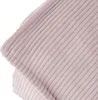 A close-up view of the ribbed texture of a pink corduroy fabric. Produktbild-Vorschau