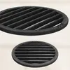 Two black cast iron grates are shown against a neutral background. The top grate is larger and angled, while the bottom grate is smaller and viewed from a slightly different angle. Produktbild-Vorschau