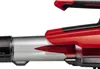 Close-up of a red and black leaf blower nozzle. Produktbild-Vorschau
