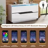 A white and black high-gloss sideboard with LED lighting, displayed alongside screenshots of a mobile app that controls the lighting. Voir les images du produit