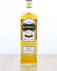 A bottle of Bushmills Original Irish Whiskey sits on a wooden surface against a white background. Produktbild-Vorschau